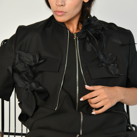 BLACK JACKET WITH BROOCHES